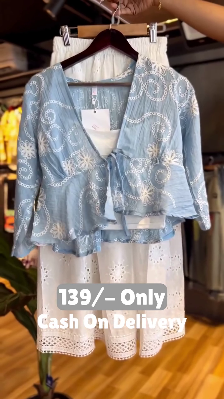 Elegant Blue Embroidered Top with White Lace Skirt